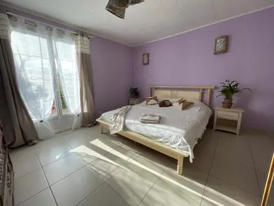 Un ou plusieurs lits dans un hébergement de l'établissement Chambre d'hôte