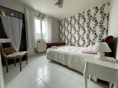 Un ou plusieurs lits dans un hébergement de l'établissement Chambre d'hôte