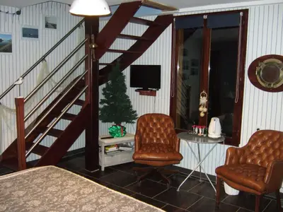 Télévision ou salle de divertissement dans l'établissement La Maison de l'Epousée B&B