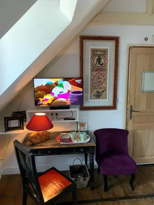 Télévision ou salle de divertissement dans l'établissement Chambres d'Hôtes Villa Mon Repos