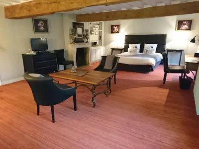 Un ou plusieurs lits dans un hébergement de l'établissement Côté Jardin - Chambres d'hôtes