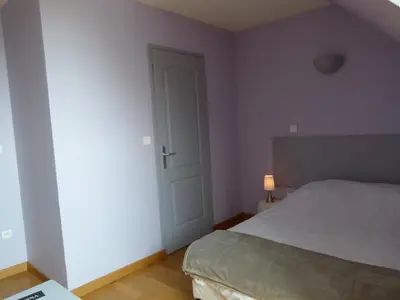 Un ou plusieurs lits dans un hébergement de l'établissement Hôtel Victor