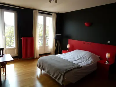 Un ou plusieurs lits dans un hébergement de l'établissement Hôtel Victor