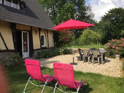 Jardin de l'établissement Charmante Maison entre les Pommiers