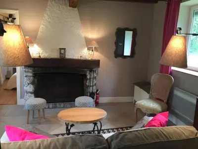 Coin salon dans l'établissement Charmante Maison entre les Pommiers