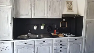Cuisine ou kitchenette dans l'établissement Plage port tout à pied