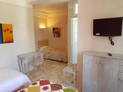 Télévision ou salle de divertissement dans l'établissement Come Inn