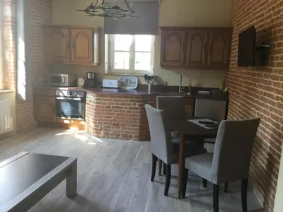 Cuisine ou kitchenette dans l'établissement Logis de l'orangerie