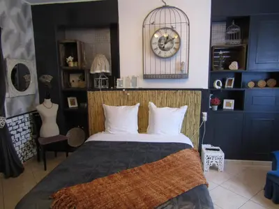 Un ou plusieurs lits dans un hébergement de l'établissement Chambre d'hôtes Au Nid du Thil
