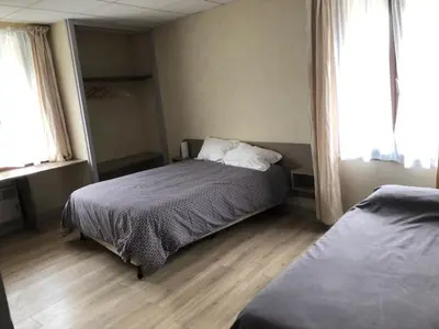 Un ou plusieurs lits dans un hébergement de l'établissement Hôtel De La Mare -restaurant pour les clients sur réservation