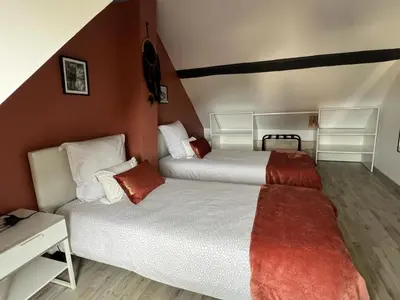 Un ou plusieurs lits dans un hébergement de l'établissement Maison de Caractère