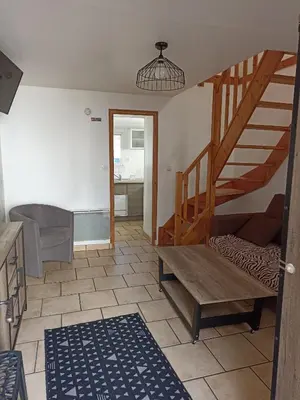 Coin salon dans l'établissement Le Clos Robinson