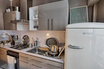 Cuisine ou kitchenette dans l'établissement Appartement type parisien 75m²