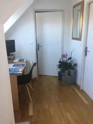 Télévision ou salle de divertissement dans l'établissement Rue de la Gare