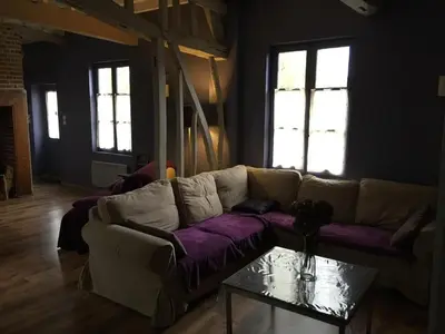 Coin salon dans l'établissement Cottage d Hamicourt