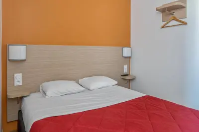 Un ou plusieurs lits dans un hébergement de l'établissement Premiere Classe Rouen Nord - Barentin