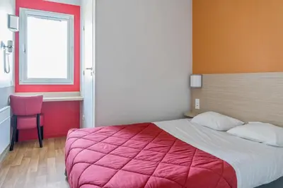 Un ou plusieurs lits dans un hébergement de l'établissement Premiere Classe Rouen Nord - Barentin