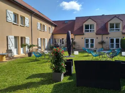 Jardin de l'établissement Hôtel Nell - Axelle - Maison Tassoni