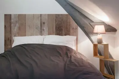 Un ou plusieurs lits dans un hébergement de l'établissement La Dimière - Appartements de standing en hyper-centre - Louviers