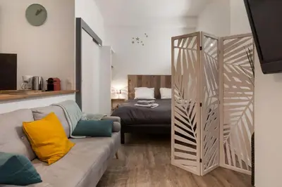 Un ou plusieurs lits dans un hébergement de l'établissement La Dimière - Appartements de standing en hyper-centre - Louviers