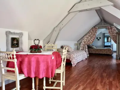 Un ou plusieurs lits dans un hébergement de l'établissement Le Domaine des Prés du Hom