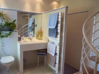 Salle de bains dans l'établissement La Charretterie
