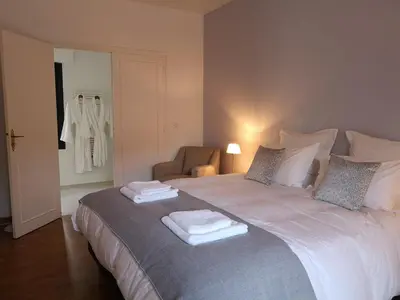 Un ou plusieurs lits dans un hébergement de l'établissement Les Enclos Bed and Breakfast à 4 mn de Chantilly