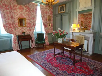 Un ou plusieurs lits dans un hébergement de l'établissement Chambres d'Hôtes de Manoir de Captot