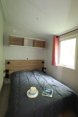 Un ou plusieurs lits dans un hébergement de l'établissement Camping Le Val de Trie