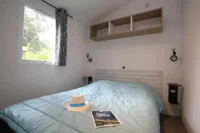 Un ou plusieurs lits dans un hébergement de l'établissement Camping Le Val de Trie