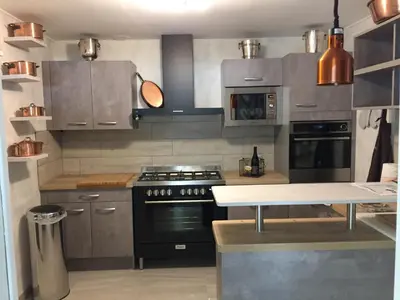 Cuisine ou kitchenette dans l'établissement La Homardine