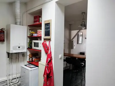 Cuisine ou kitchenette dans l'établissement LA PETITE MAISON