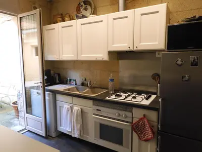 Cuisine ou kitchenette dans l'établissement Maison de Marie