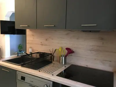 Cuisine ou kitchenette dans l'établissement Maison individuelle dans ancienne ecurie