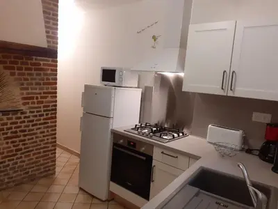 Cuisine ou kitchenette dans l'établissement Gîte de la Ferme de la Côte