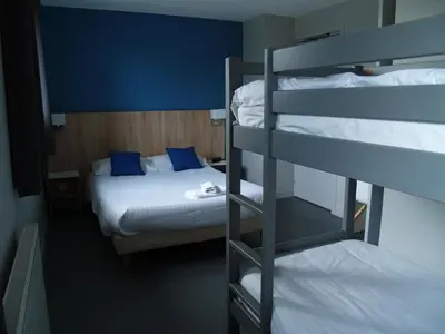 Un ou plusieurs lits dans un hébergement de l'établissement Le Relais Vauban