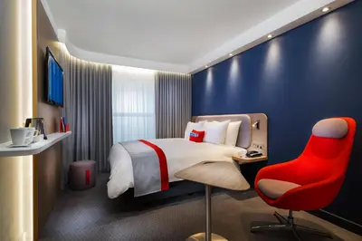 Un ou plusieurs lits dans un hébergement de l'établissement Holiday Inn Express - Rouen Centre - Rive Gauche by IHG