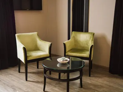 Coin salon dans l'établissement Amicitia - Hôtel & Restaurant