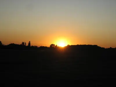 Lever ou coucher de soleil vu de le séjour chez l'habitant ou à proximité