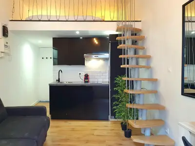 Cuisine ou kitchenette dans l'établissement Appart Rouen Centre