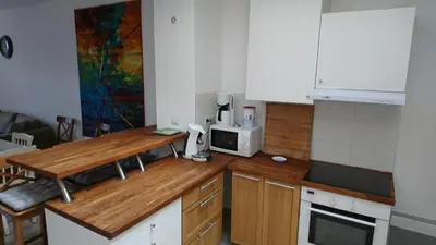 Cuisine ou kitchenette dans l'établissement Gîte le tréportais