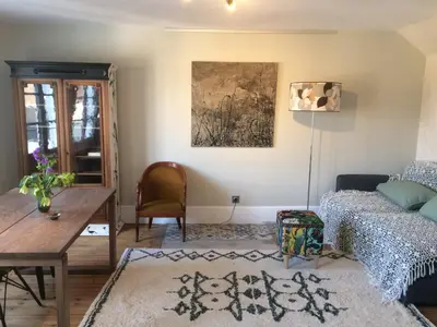Coin salon dans l'établissement Gîte de l'Écu