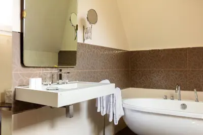 Salle de bains dans l'établissement Le Jardin des Plumes