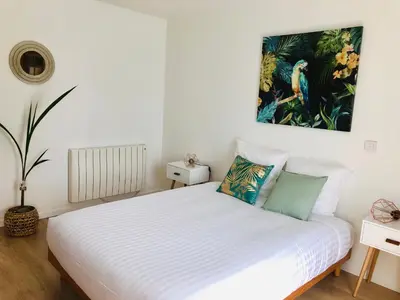 Un ou plusieurs lits dans un hébergement de l'établissement VILLA BIRDS