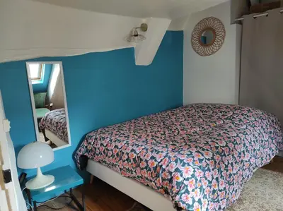 Un ou plusieurs lits dans un hébergement de l'établissement Maison hypercentre Rouen avec parking gratuit