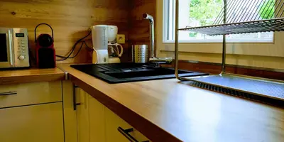 Cuisine ou kitchenette dans l'établissement Appart'HomeCity - Rouen Grand Voile