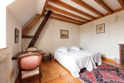 Un ou plusieurs lits dans un hébergement de l'établissement Château du Jard