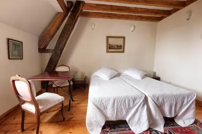 Un ou plusieurs lits dans un hébergement de l'établissement Château du Jard