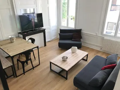 Télévision ou salle de divertissement dans l'établissement Le secret de Léa