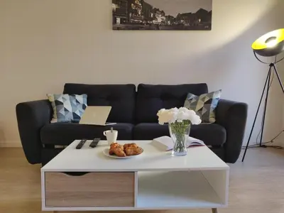 Coin salon dans l'établissement Appart'HomeCity - Rouen Vauban